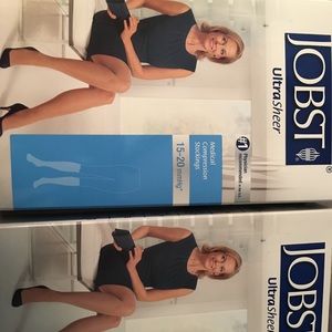 Two boxes of medical compression stockings